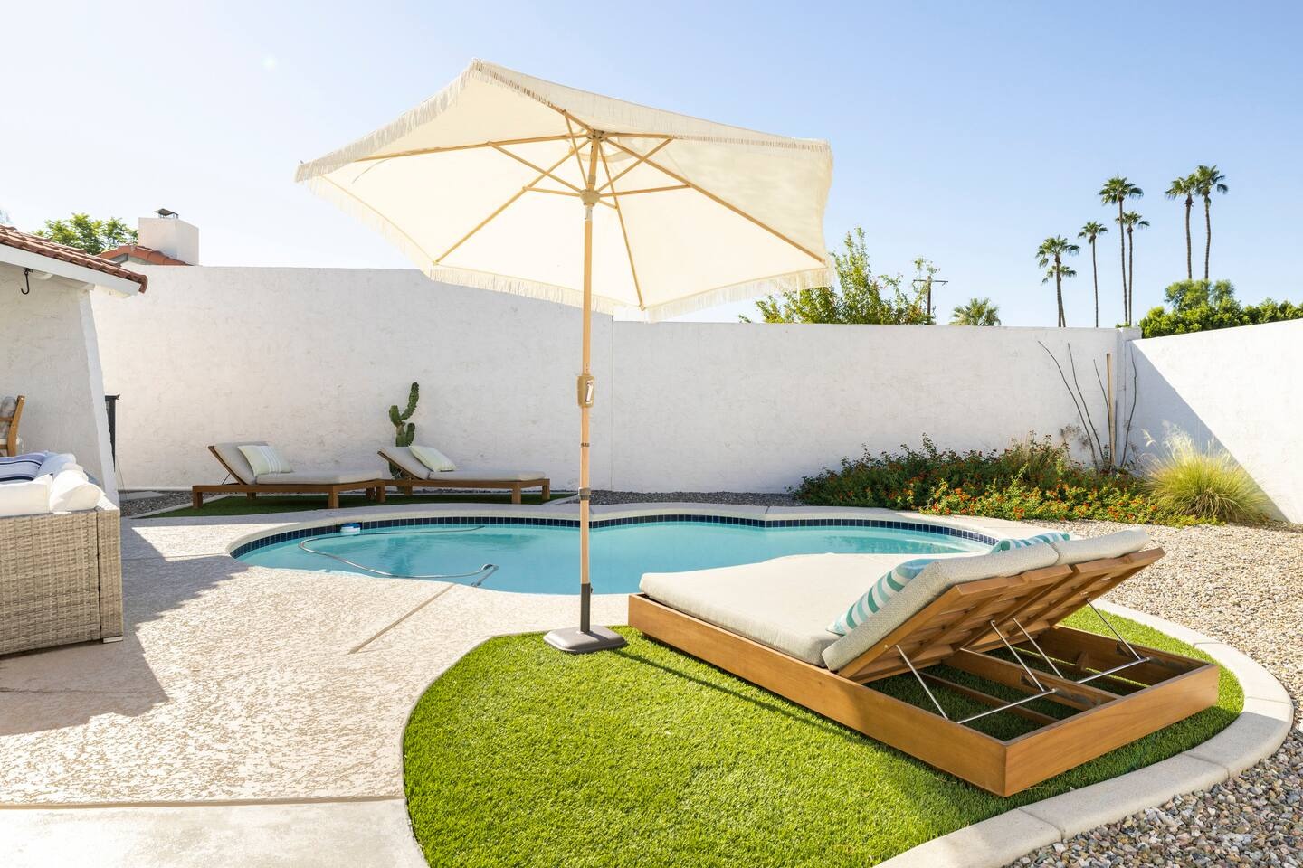 Private walled pool courtyard at the entrance of 3037 E Clarendon Ave